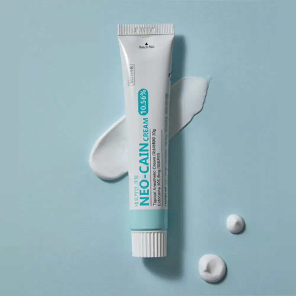 Neo Cain Numbing Cream 10.56% Lidocaine by Derma Essence, 30g tube, shown in the image with packaging and applicator.