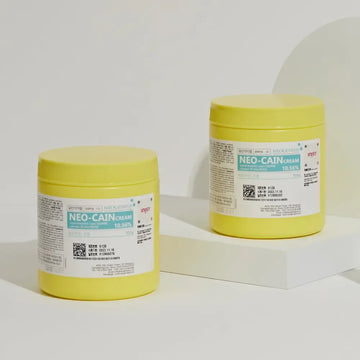 Tube of Derma Essence Neo-Cain Numbing Cream with 10.56% lidocaine, 500g, designed for topical numbing, made in Korea