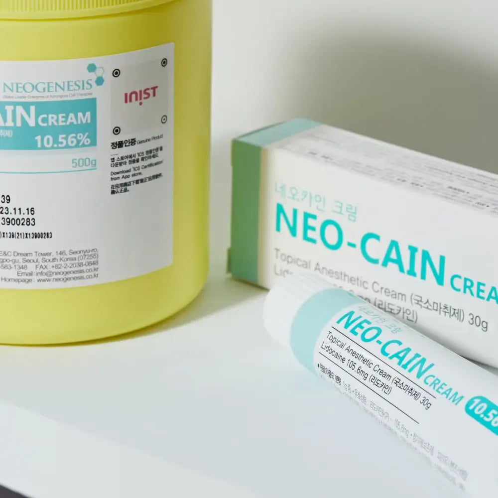 Tube of Derma Essence Neo-Cain Numbing Cream 10.56% Lidocaine in a 500g container, made in Korea, displayed on a plain background.