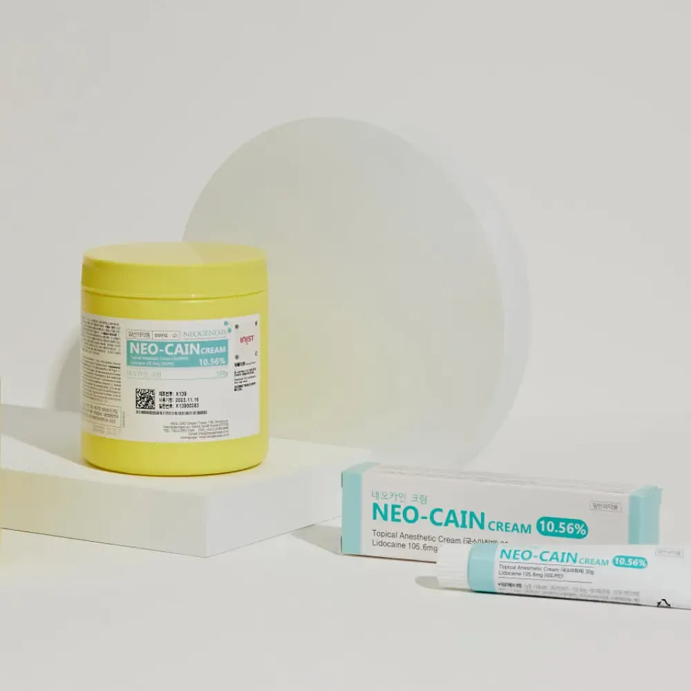 Tube of Derma Essence Neo-Cain Numbing Cream 10.56% Lidocaine, 500g, showing the product packaging and label.