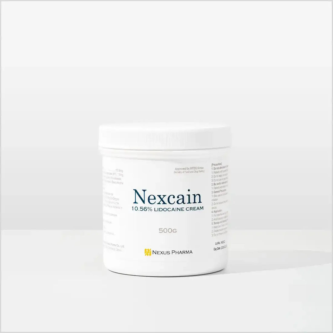 Jar of Derma Essence Nexcain Lidocaine Cream for numbing, made in Korea, shown in a clear container with cream inside.