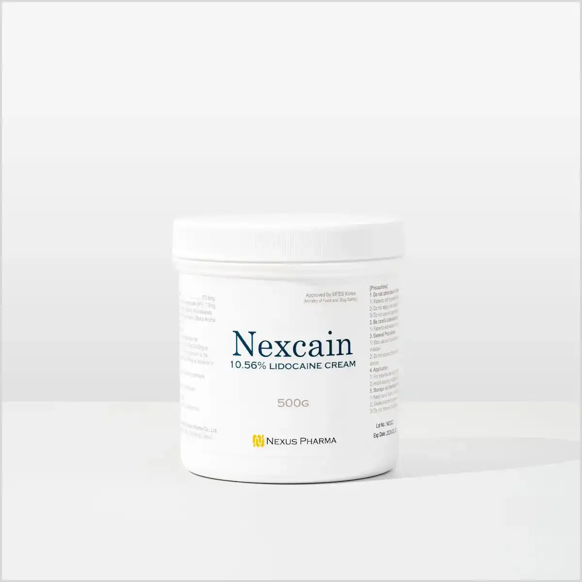 Jar of Derma Essence Nexcain Lidocaine Cream for numbing, made in Korea, shown in a clear container with cream inside.